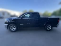 Ram 1500 Big Horn 4x4 Quad Cab 6'4" Box 2026 — side view