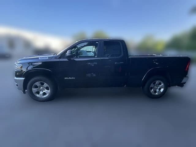Ram 1500 Big Horn 4x4 Quad Cab 6'4" Box 2026 — side view