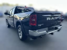 Ram 1500 Big Horn 4x4 Quad Cab 6'4" Box 2026 — side view