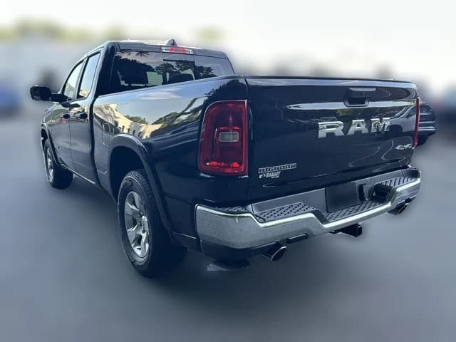 Ram 1500 Big Horn 4x4 Quad Cab 6'4" Box 2026 — side view