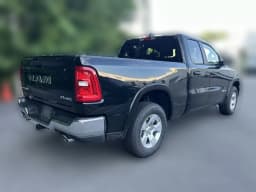 Ram 1500 Big Horn 4x4 Quad Cab 6'4" Box 2026 — side view