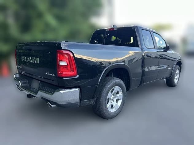 Ram 1500 Big Horn 4x4 Quad Cab 6'4" Box 2026 — side view