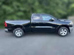 Ram 1500 Big Horn 4x4 Quad Cab 6'4" Box 2026 — side view