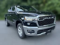 Ram 1500 Big Horn 4x4 Quad Cab 6'4" Box 2026 — side view