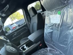 Ram 1500 Big Horn 4x4 Quad Cab 6'4" Box 2026 — side view