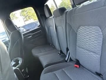 Ram 1500 Big Horn 4x4 Quad Cab 6'4" Box 2026 — side view