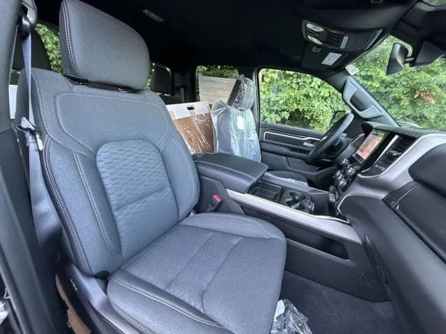 Ram 1500 Big Horn 4x4 Quad Cab 6'4" Box 2026 — side view