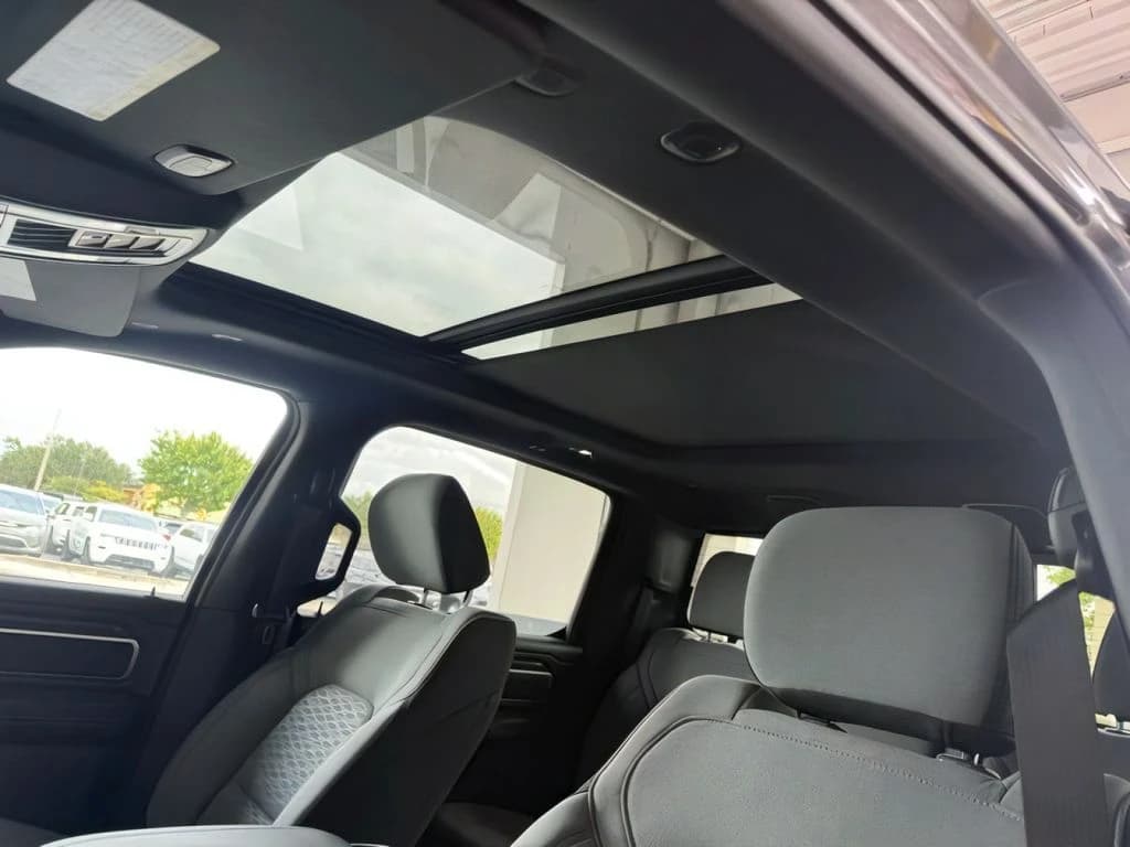 Ram 1500 Big Horn 4x4 Crew Cab 5'7" Box 2026 — side view