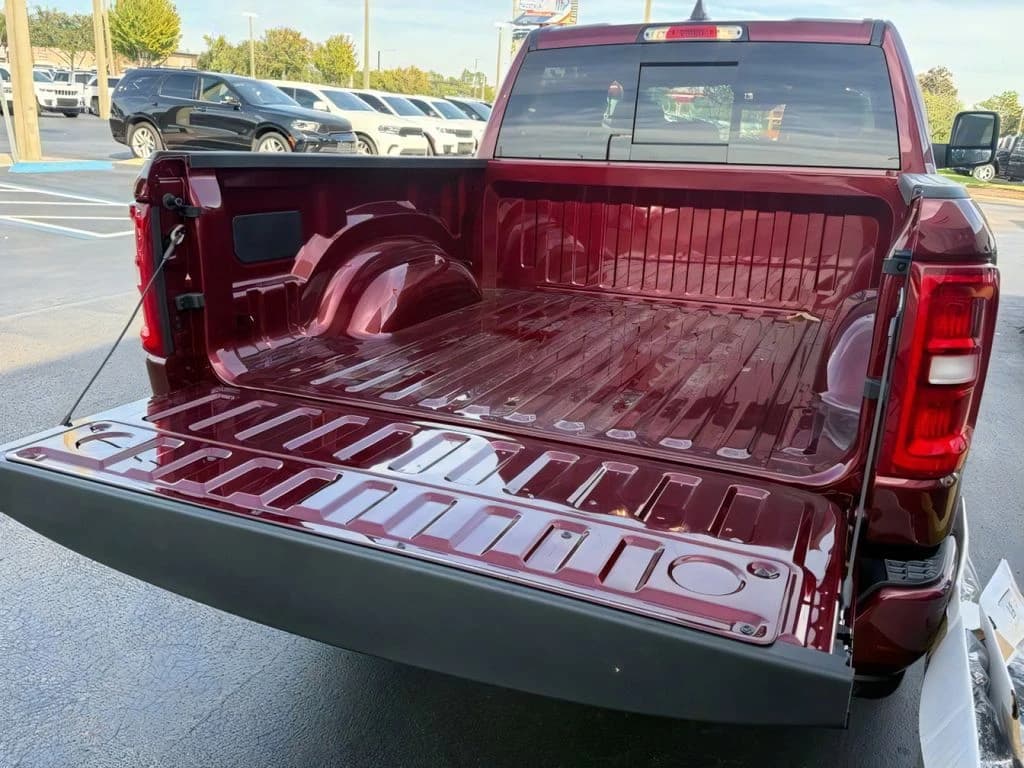 Ram 1500 Big Horn 4x4 Crew Cab 5'7" Box 2026 — side view