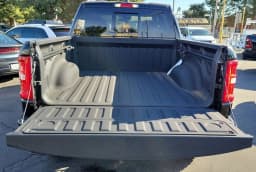 Ram 1500 Big Horn 4x4 Crew Cab 5'7" Box 2025 — side view