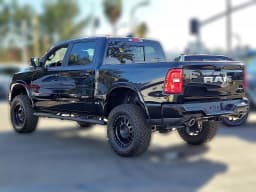 Ram 1500 Big Horn 4x4 Crew Cab 5'7" Box 2025 — side view