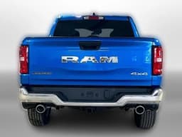Ram 1500 Big Horn 4x4 Crew Cab 5'7" Box 2026 — side view