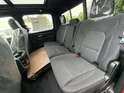 Ram 1500 Big Horn 4x4 Crew Cab 5'7" Box 2026 — side view