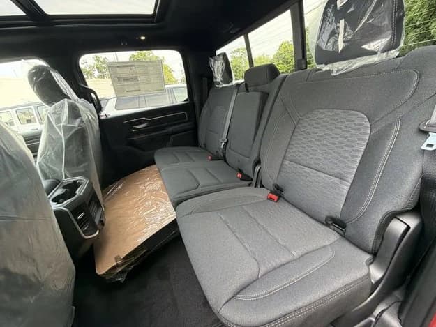 Ram 1500 Big Horn 4x4 Crew Cab 5'7" Box 2026 — side view