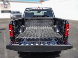 Ram 1500 Big Horn 4x4 Crew Cab 5'7" Box 2026 — side view