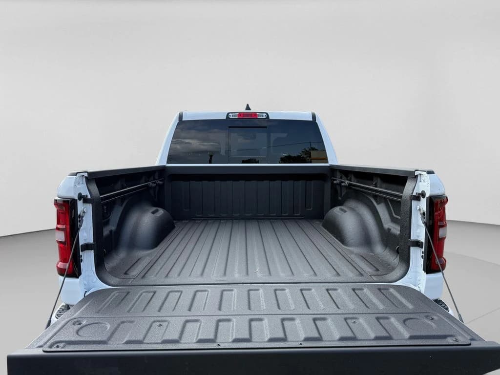 Ram 1500 Big Horn 4x4 Crew Cab 5'7" Box 2026 — side view