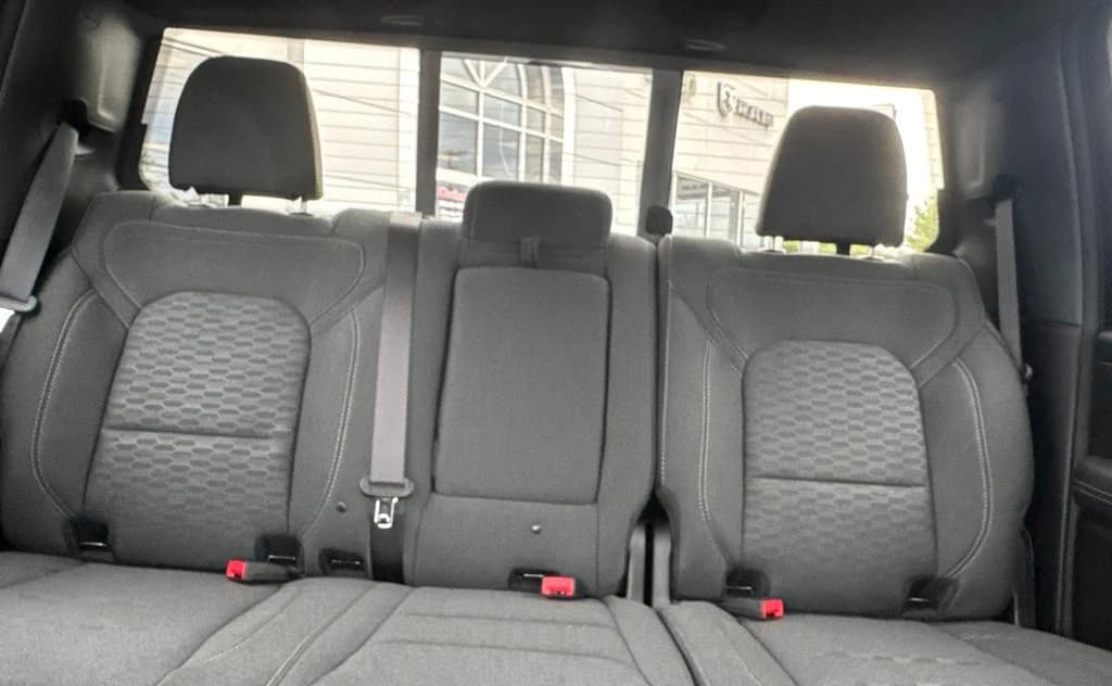 Ram 1500 Big Horn 4x4 Crew Cab 5'7" Box 2026 — side view