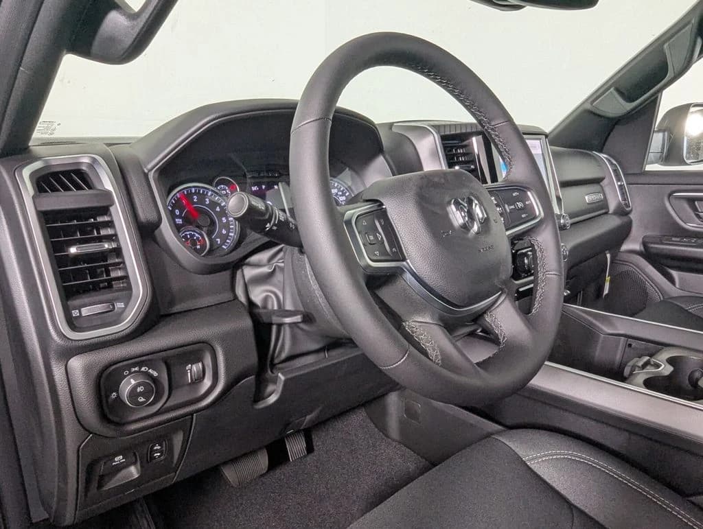 Ram 1500 Big Horn 4x4 Crew Cab 5'7" Box 2026 — side view