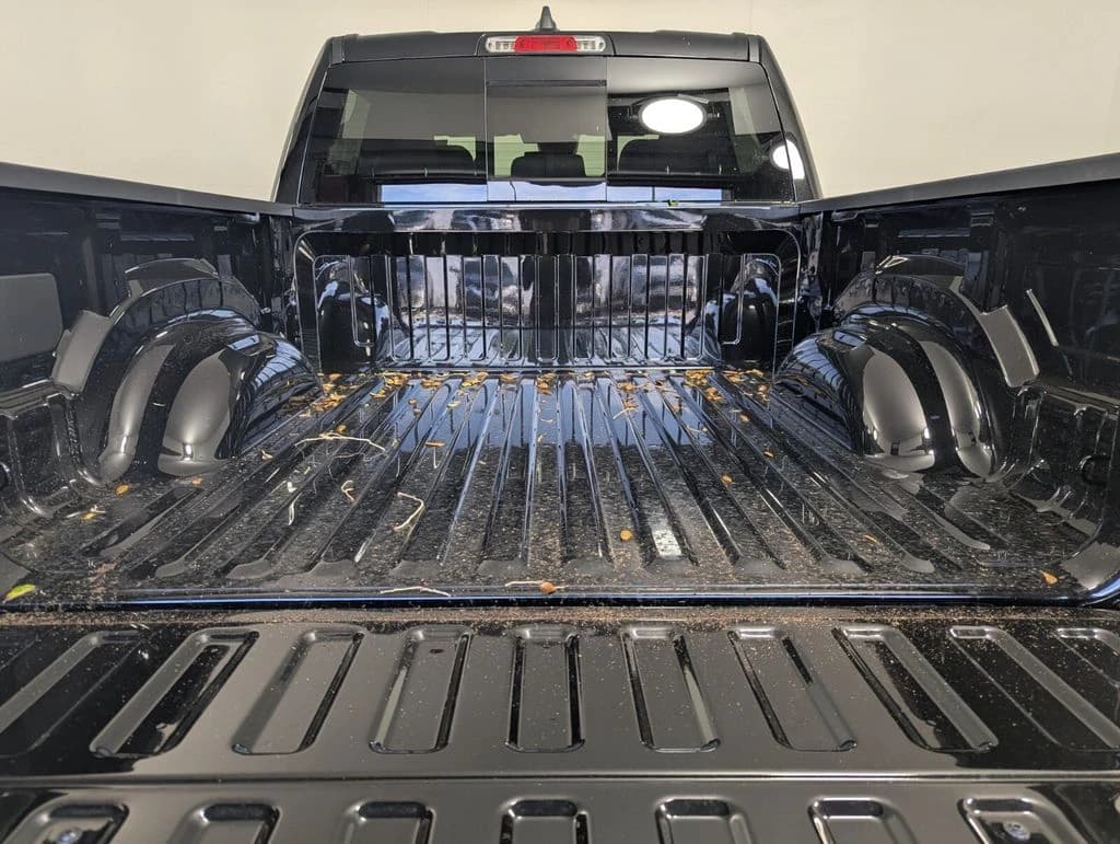 Ram 1500 Big Horn 4x4 Crew Cab 5'7" Box 2026 — side view