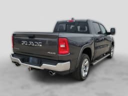 Ram 1500 Big Horn 4x4 Crew Cab 5'7" Box 2026 — side view