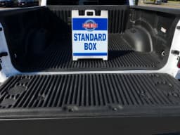 Ram 1500 Big Horn 4x4 Crew Cab 5'7" Box 2026 — side view