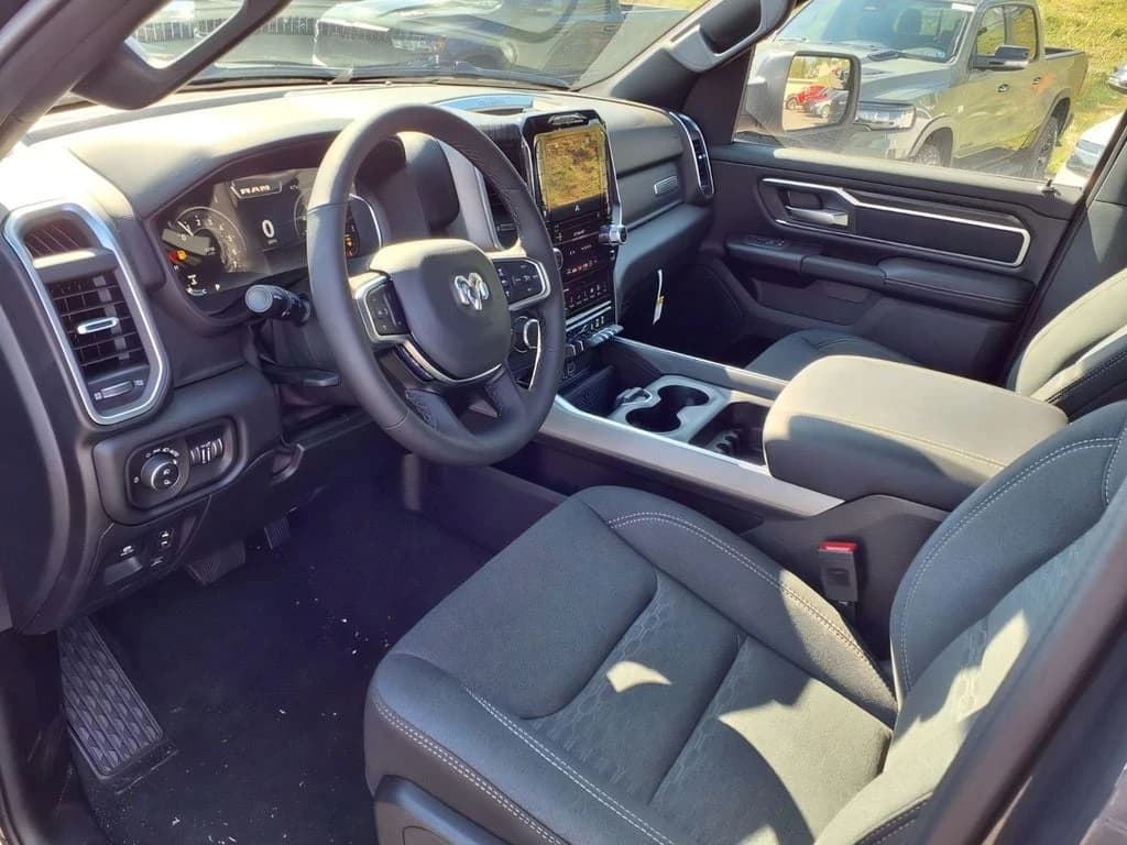 Ram 1500 Big Horn 4x4 Crew Cab 5'7" Box 2026 — side view