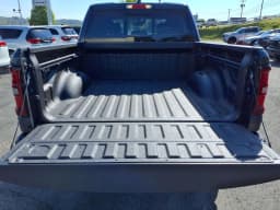 Ram 1500 Big Horn 4x4 Crew Cab 5'7" Box 2026 — side view