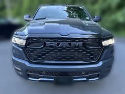 Ram 1500 Express 4x4 Crew Cab 5'7" Box 2026 — side view
