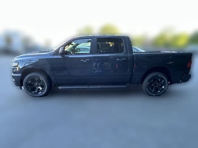 Ram 1500 Express 4x4 Crew Cab 5'7" Box 2026 — side view