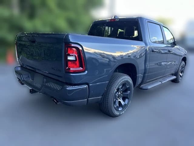 Ram 1500 Express 4x4 Crew Cab 5'7" Box 2026 — side view