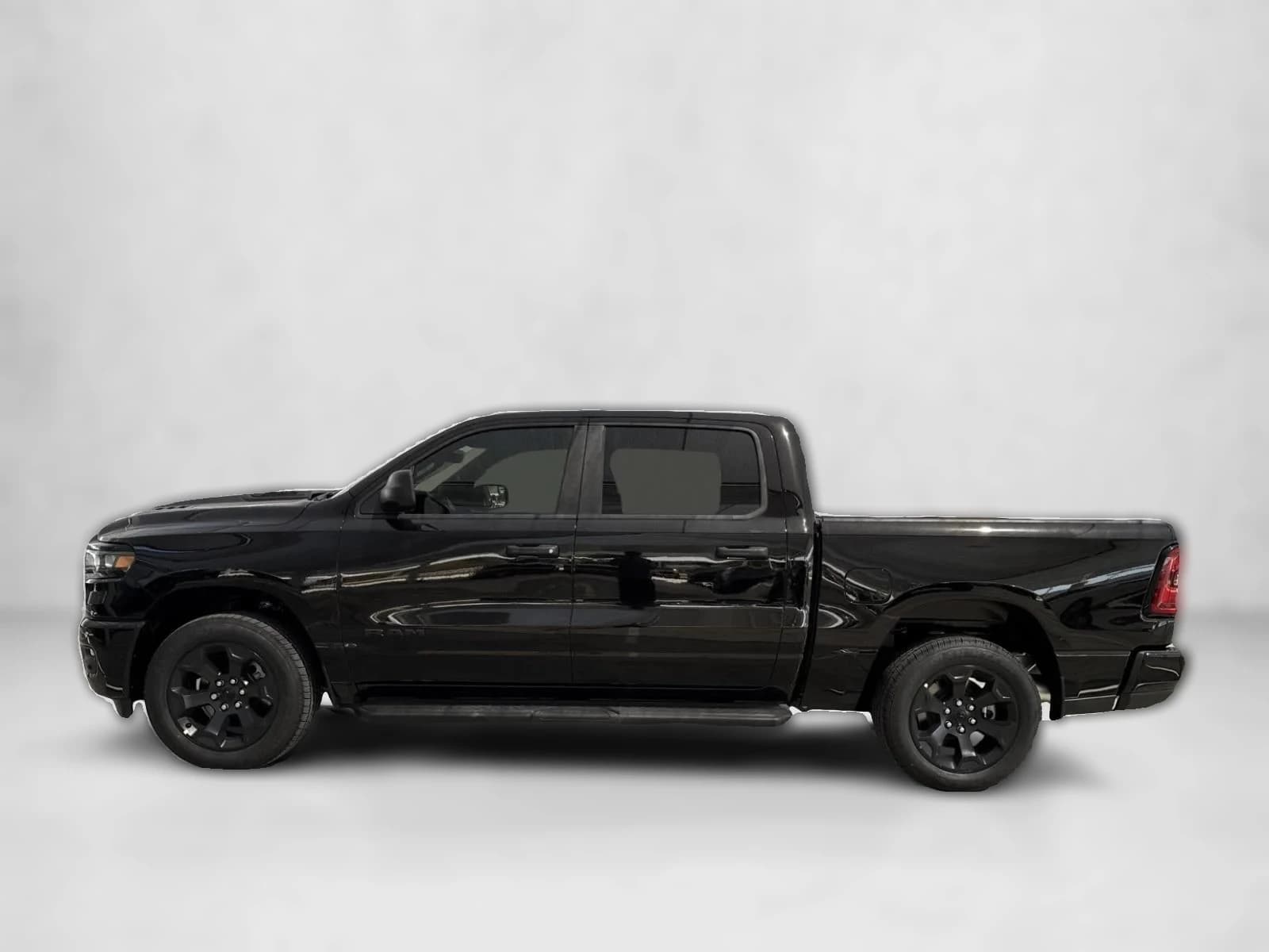 Ram 1500 Express 4x4 Crew Cab 5'7" Box 2026 — side view