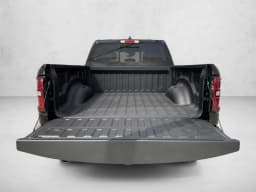 Ram 1500 Express 4x4 Crew Cab 5'7" Box 2026 — side view