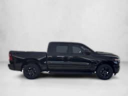 Ram 1500 Express 4x4 Crew Cab 5'7" Box 2026 — side view