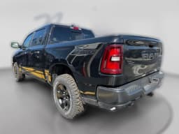 Ram 1500 Warlock 4x4 Crew Cab 5'7" Box 2026 — side view