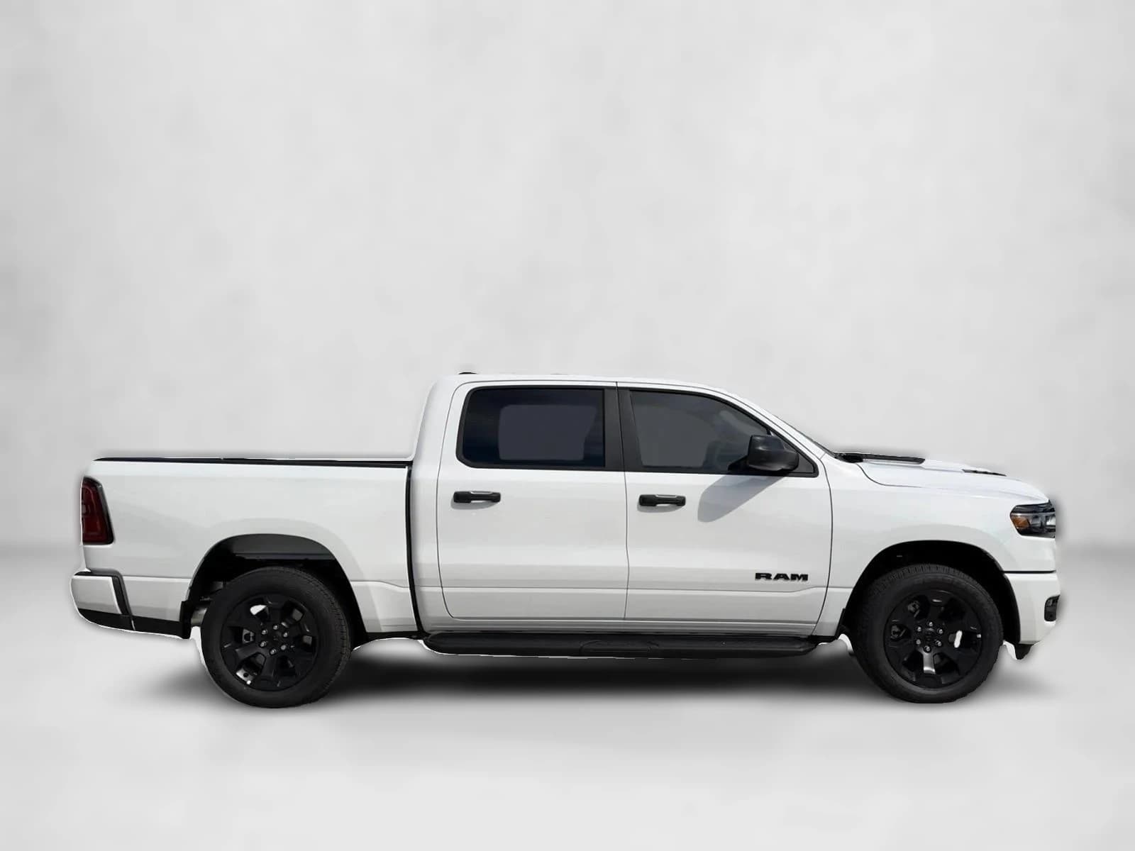 Ram 1500 Express 4x4 Crew Cab 5'7" Box 2026 — side view