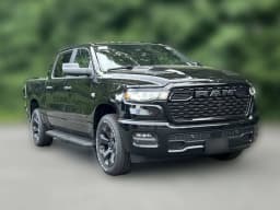 Ram 1500 Express 4x4 Crew Cab 5'7" Box 2026 — side view