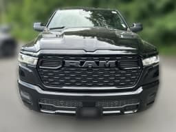 Ram 1500 Express 4x4 Crew Cab 5'7" Box 2026 — side view