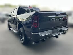 Ram 1500 Express 4x4 Crew Cab 5'7" Box 2026 — side view