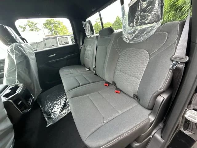 Ram 1500 Express 4x4 Crew Cab 5'7" Box 2026 — side view