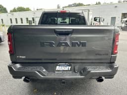 Ram 1500 Express 4x4 Crew Cab 5'7" Box 2026 — side view