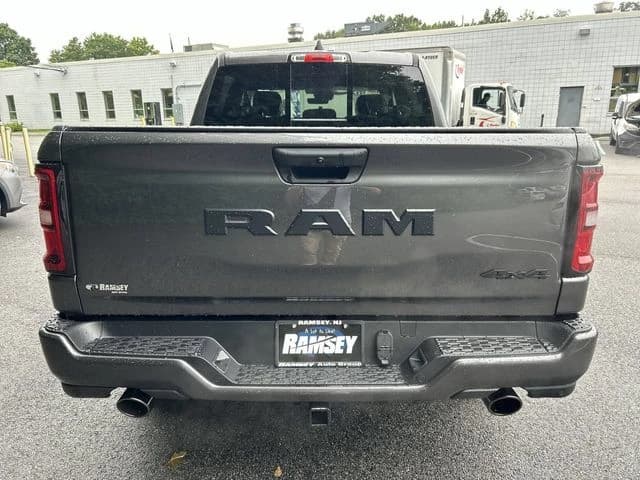 Ram 1500 Express 4x4 Crew Cab 5'7" Box 2026 — side view