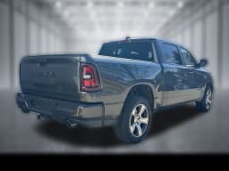 Ram 1500 Express 4x4 Crew Cab 5'7" Box 2026 — side view