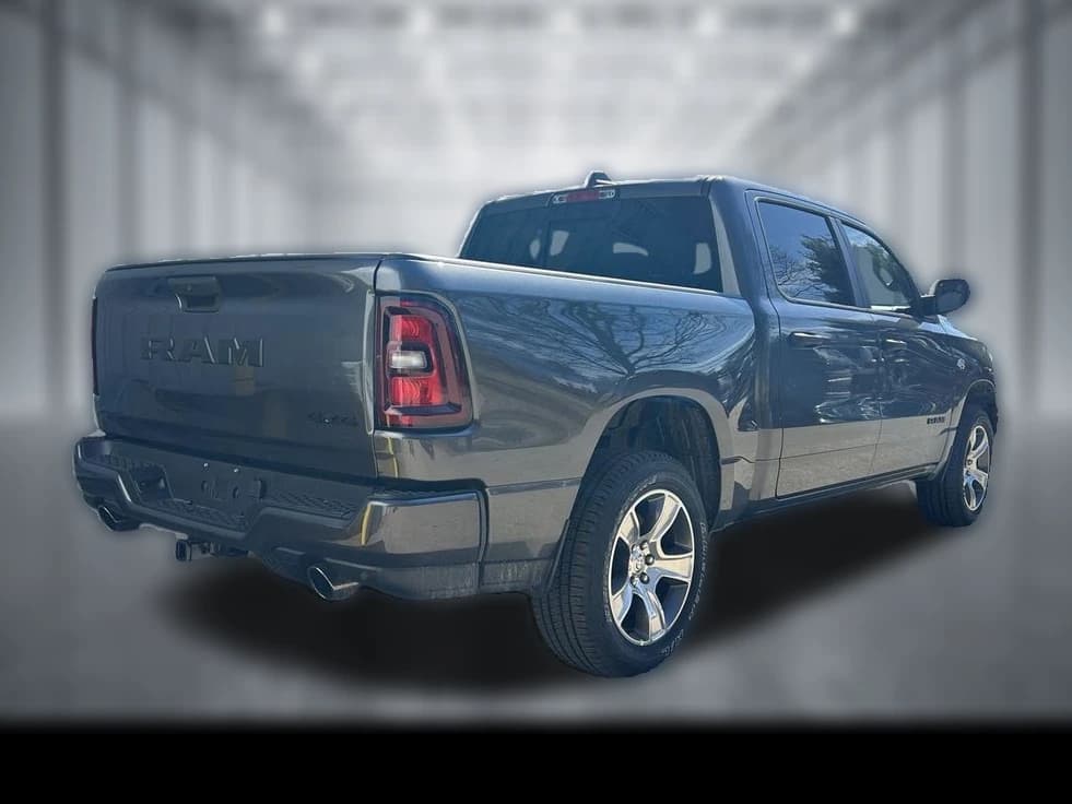 Ram 1500 Express 4x4 Crew Cab 5'7" Box 2026 — side view