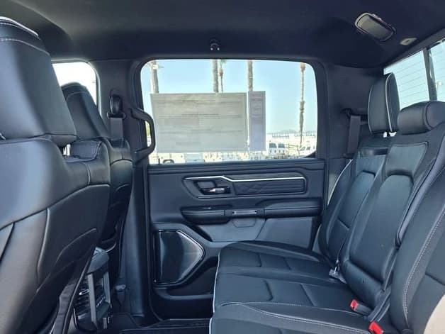 Ram 1500 Limited 4x4 Crew Cab 5'7" Box 2026 — side view