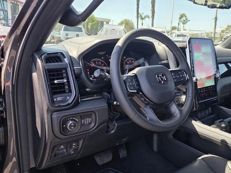 Ram 1500 Limited 4x4 Crew Cab 5'7" Box 2026 — side view