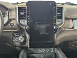 Ram 1500 Longhorn 4x4 Crew Cab 5'7" Box 2026 — side view