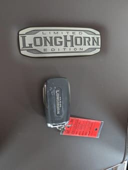Ram 1500 Longhorn 4x4 Crew Cab 5'7" Box 2026 — side view