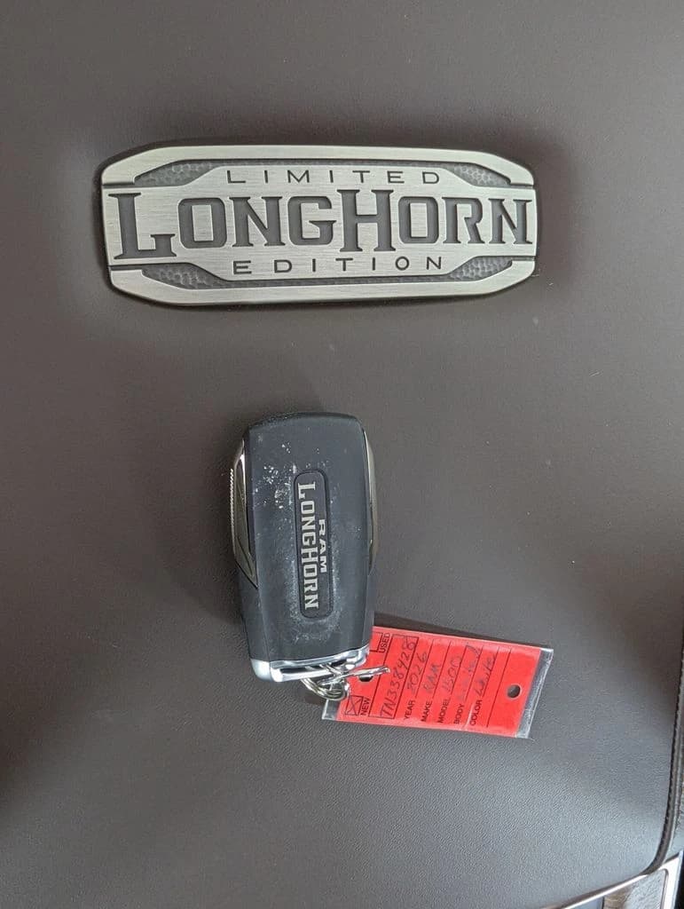 Ram 1500 Longhorn 4x4 Crew Cab 5'7" Box 2026 — side view