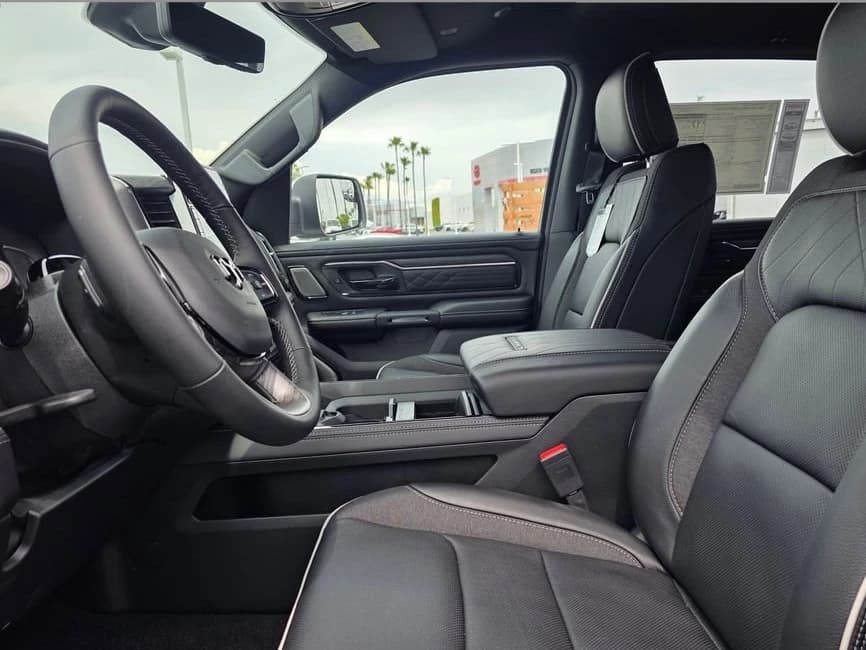 Ram 1500 Limited 4x4 Crew Cab 5'7" Box 2026 — side view