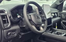 Ram 1500 Limited 4x4 Crew Cab 5'7" Box 2026 — side view